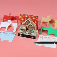 Calendrier 3D 2026 - Maison enneigée de Noël